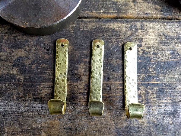 http://browncountyforge.com/wp-content/uploads/2019/05/Decorative-Brass-Wall-Hooks-Brown-County-Forge.jpg